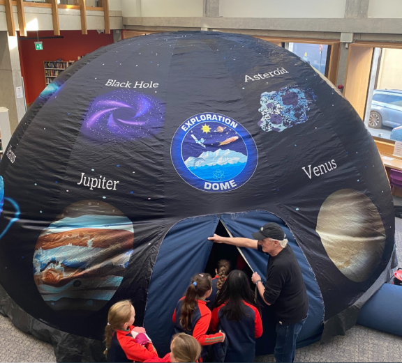 Pop up planetarium dome with children