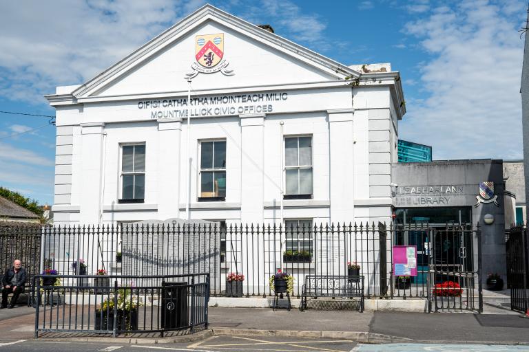 Image shows front of Mountmellick Library Building in daylight