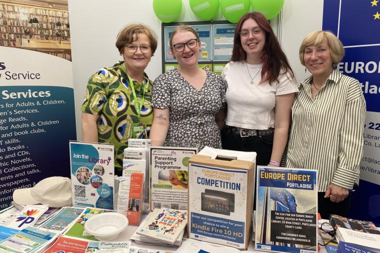 Library staff at information stand