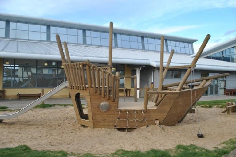 wooden pirate ship in sand at the portlaoise leisure centre playground