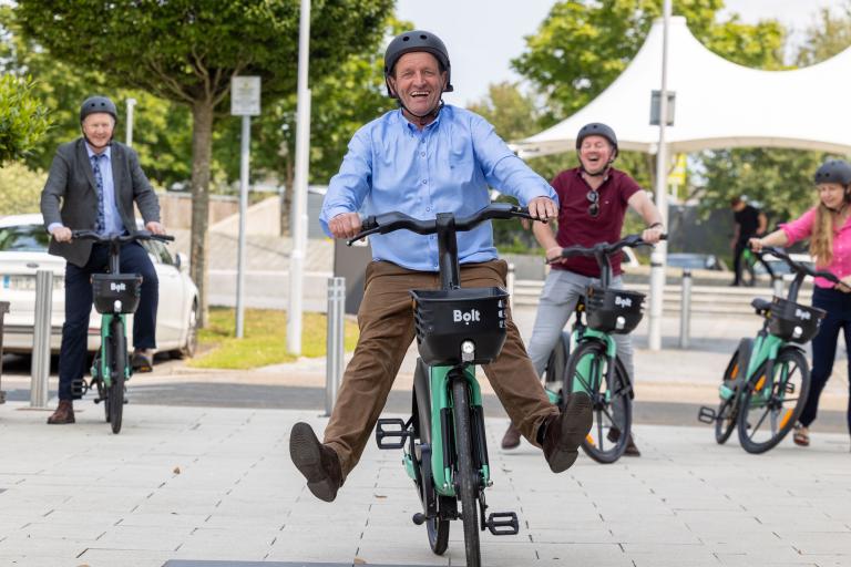 local councillor willie aird riding an ebike at its official launch for portlaoise