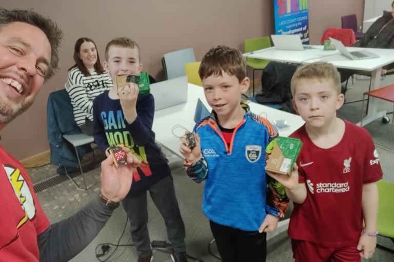 Children with microbit controllers at DojoMór 2024