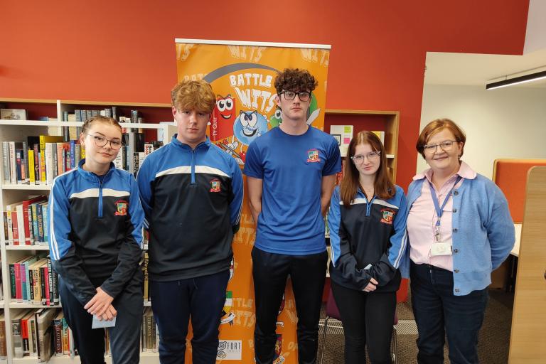 Students in library with librarian