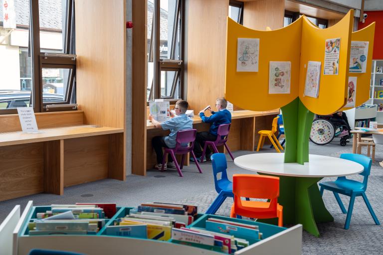 Children reading in library