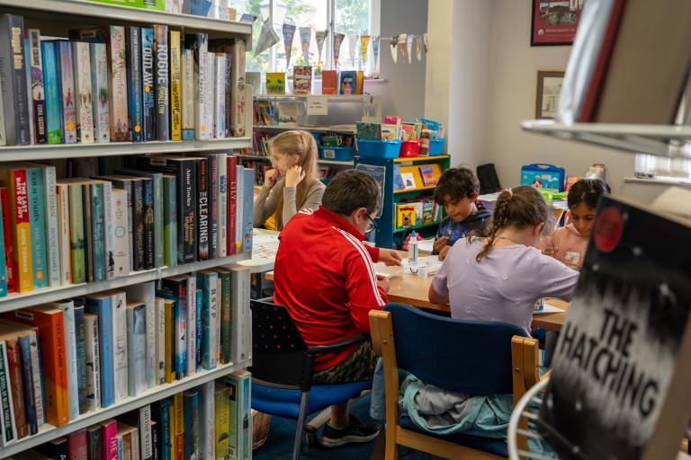 Children doing crafts in the library