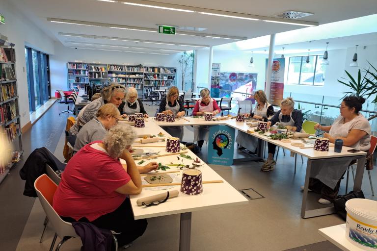 People working with ceramics