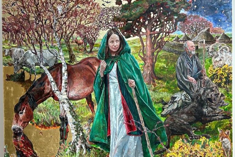 Brigid with a staff by a body of water. Conleth is in the mid ground to her right. Animals including a horse, a wolfhound, a fox, goats and cows are also in the surroundings.