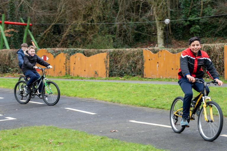 students using the upcycled bikes from the bike library