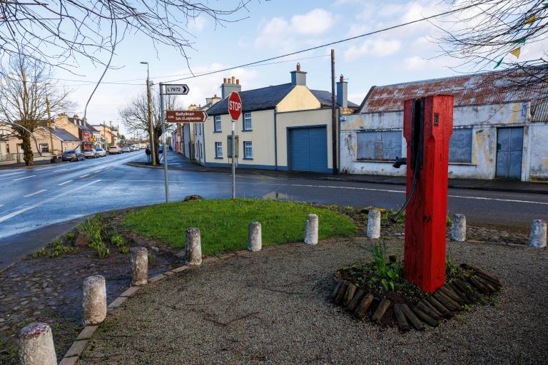 Image of Ballylinan village and iconic heritage red water pump