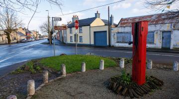 Image of Ballylinan village and iconic heritage red water pump