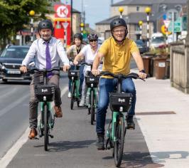 Two men and two women using the bolt bikes on the cycle paths in Portlaoise