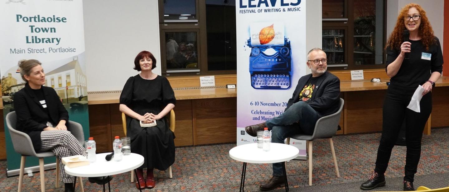 4 people speaking at library event