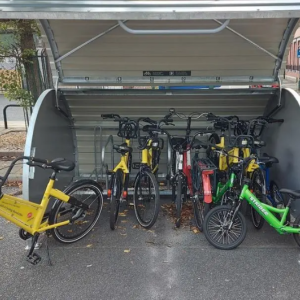 Images of bikes in a designed shed for them